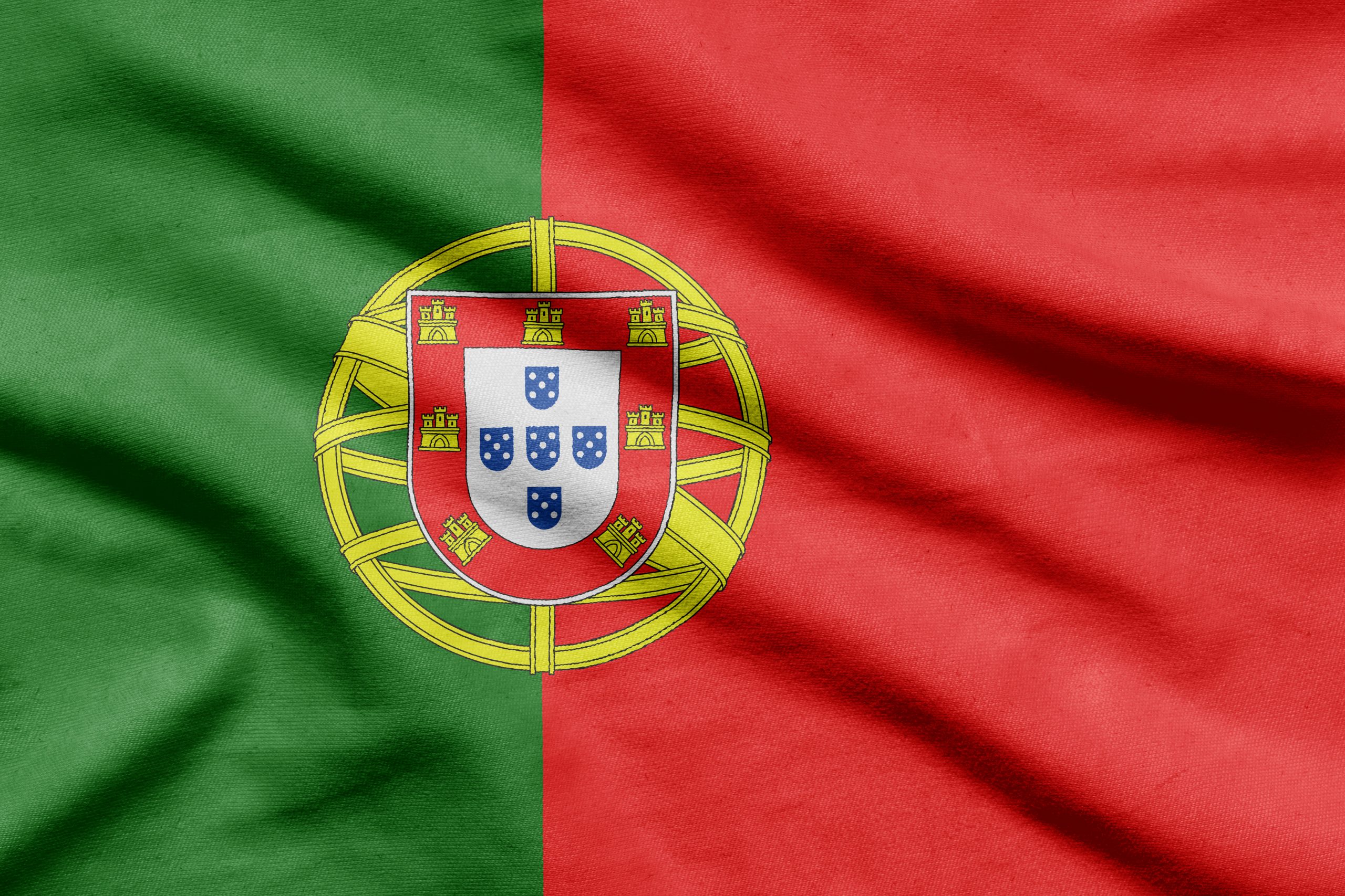 Flag of Portugal on wavy fabric.